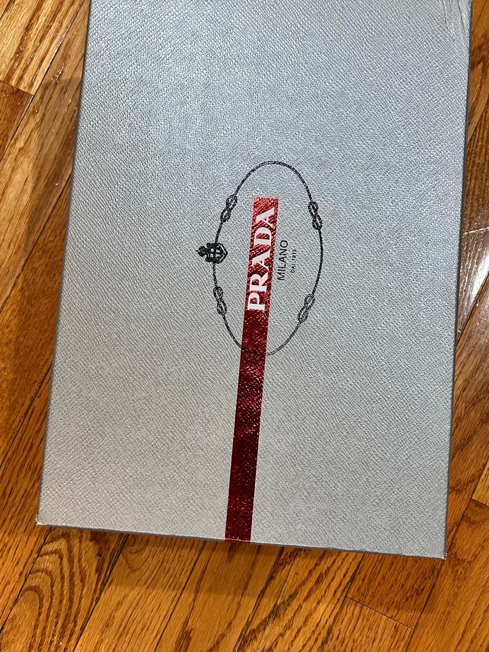 Prada Black High-Top Sneaker with Red Logo Stripe - Picture 2 of 7